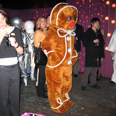 A host of costumed characters—including a life-size gingerbread man, a bear and an assortment of pirates and prom queens—roved among the guests.