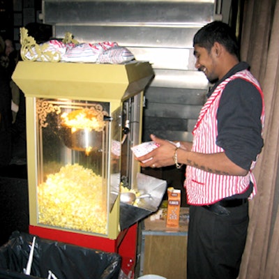 Popcorn and cotton candy carts from the New York Fun Factory gave the party a carnival feel.