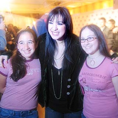 Michelle Branch posed with young fans at YM's MTV issue party at Spirit.