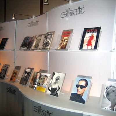 In the cocktail lounge, a display wall of Silhouette ads and eyeglasses showed the evolution of the brand.