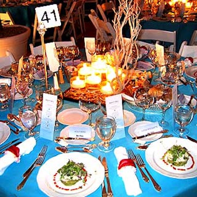 Sea-blue table linens matched the 'black tie with a touch of beach' theme.