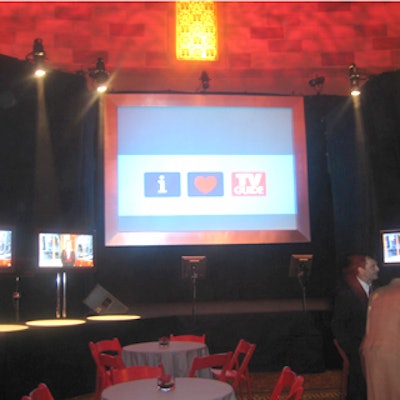 Wizard Studios erected a large set flanked by two curving walls covered with starry silver lights. A large, brushed-metal framed screen stood in the rear.