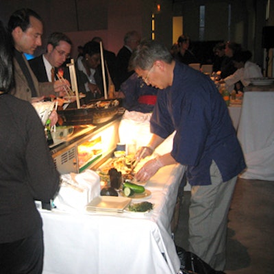 A chef prepared sushi on the spot.