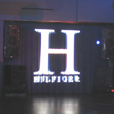 Projections of the H logo branded the event space.