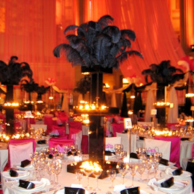 For the New York Academy of Art's Tribeca Ball, Antony Todd suspended sheer pink fabric from Gotham Hall's oval-shaped light truss. Canopied square tables skirted the perimeter of the dining area, and round tables filled in the center.