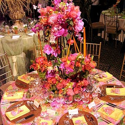 Belle Fleur's table for Lily Pulitzer featured a Pulitzer-print tablecloth and green woven baskets suspended from a scrolling wrought iron centerpiece.