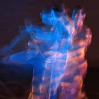 Dancers in motion were creatively lit by colored spotlights.