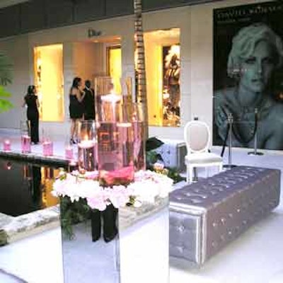 RBK Productions elegantly adorned the Christian Dior storefront at the Bal Harbour Shops with pink flowers and pink luminaries for the 'D' Trick couture collection launch party.