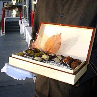 Caterwaiters passed Abigail Kirsch's wild mushroom or foie gras hors d'oeuvres from wooden cigar boxes.