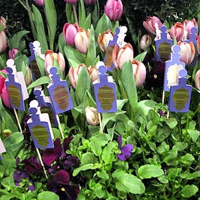 Surrounding Monn's topiary, a garden featured perfume samples tucked amidst the spring flowers.