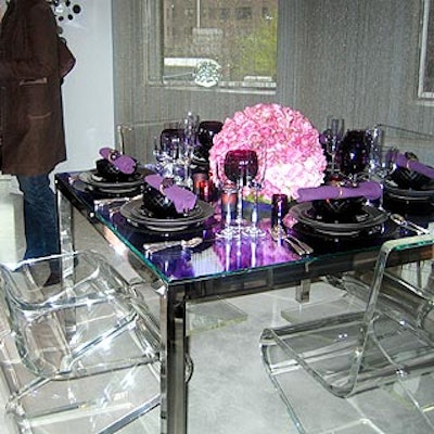 Clear tables and chairs displayed some of the products from Cowie's tabletop collections.
