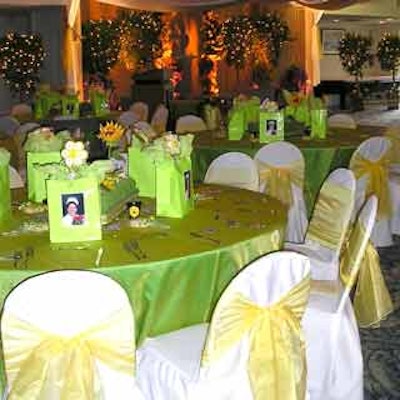 Vivid linens supplied by Gables Linen and flowers arranged by Hirni's Florist added color and complimented the 'Sunny Side Up' garden theme.
