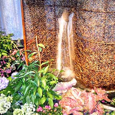 A working fountain surrounded by potted plants and flowers added cheer to the Veuve Clicquot-sponsored cocktail hour preceding the awards presentation.