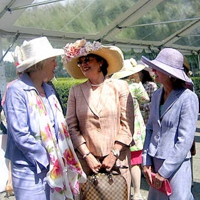 Guests of the Central Park Conservancy's Frederick Law Olmsted awards luncheon wore spring hats, per tradition, and awaited lunch under a transparent tent from Stamford Tent and Party Rentals.