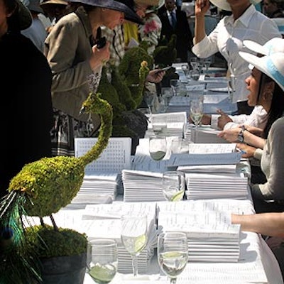 Topiaries sat atop the registration tables.