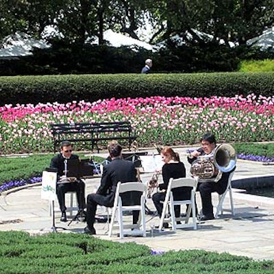 A classical quintet from Central Park Brass performed a concert in the garden before lunch.