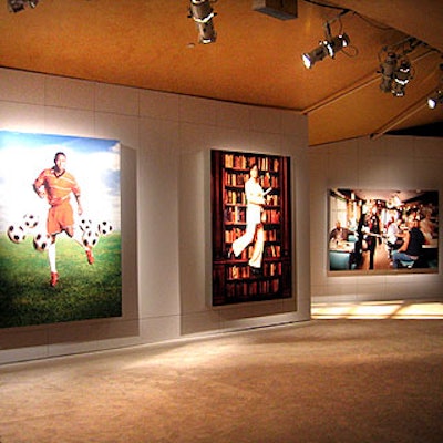 White walls and carpeting covered the venue's entryway. Large photographs of the evening's honorees covered the walls.