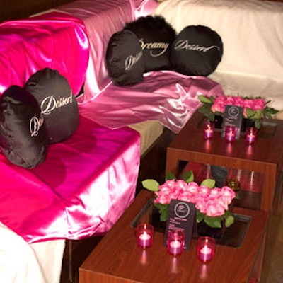The Strategic Group created girly, pink decor including pink roses and branded pillows.