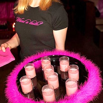Match Catering and Eventstyles' Dessert-inspired menu included watermelon smoothies served on boa-wrapped trays.
