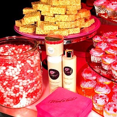Match served desserts like cupcakes alongside pink jelly beans.
