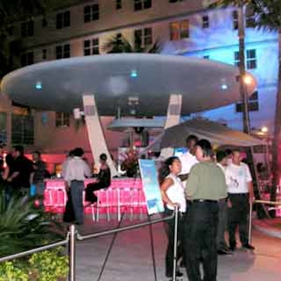 The Clevelander's outside walls and sidewalk cafe were illuminated in pastel colors, synonymous with the South Beach scene.