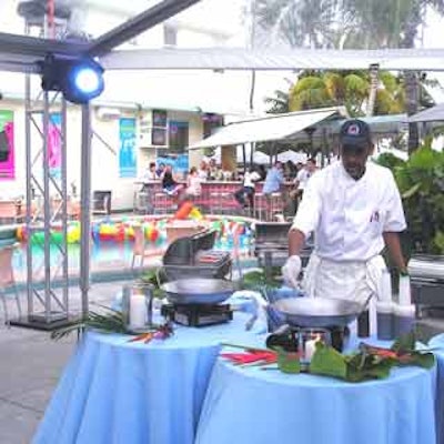 A poolside wok station featured several kinds of Asian-inspired cuisine.