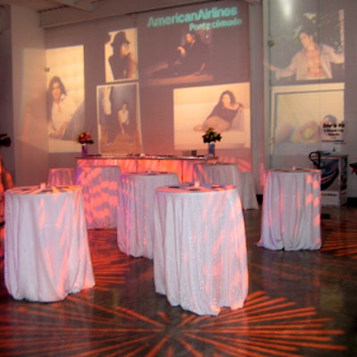 Finelite projected images of the 50 people named in the magazine on the walls throughout the space.