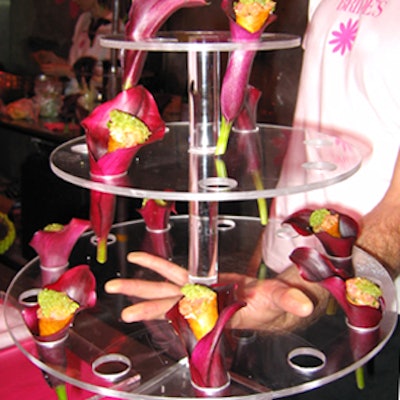 At Brides magazine's Celebrate Flowers event to promote its summer issue at the G. Page Wholesale Flowers, Callahan Catering placed tuna tartare in plantain cones with wasabi caviar in calla lily blooms and served it on multitiered Lucite trays.