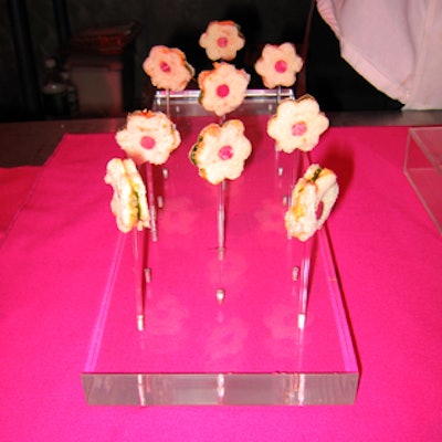 Callahan Catering served flower-shaped tea sandwiches on popsicle sticks from clear Lucite trays.