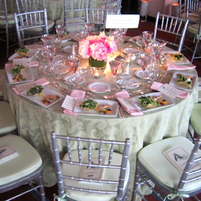 The decor had a preppy green and pink look: Party Rental used celadon-colored tablecloths and rose-tinted water glasses, and Shields Warendorff Florists created pretty centerpieces with pink peonies and roses.