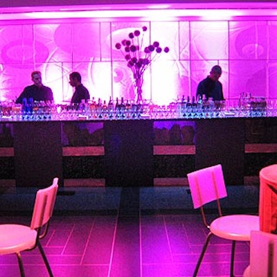 The pink backlit bar in another lounge was one of five bars brought in by Flowers, Sticks & Stones: Designs by Susan Edgar.