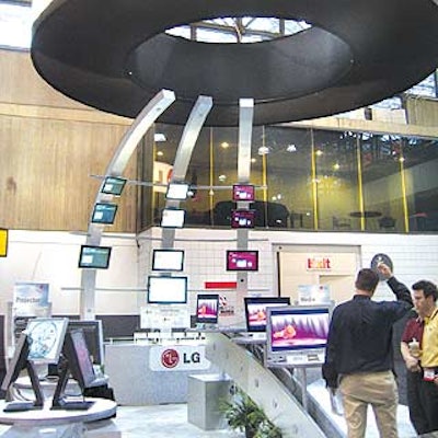 Exhibitgroup Giltspur built a soaring display for LG to display its flat-screen monitors.