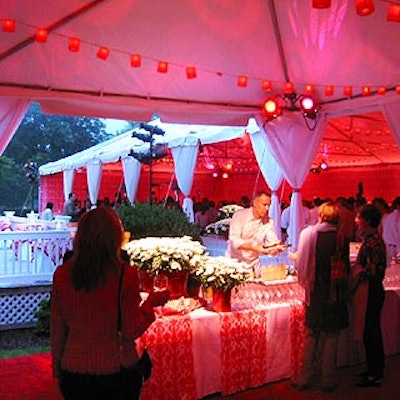 Stamford Tents tented the party space outside the inn. Avi Adler lined the ceiling with red lanterns and placed white daisies on Creative Edge Parties' bars.