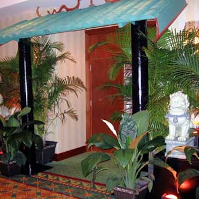 The entrance to the main room was turned into a pagoda and adorned with greenery.