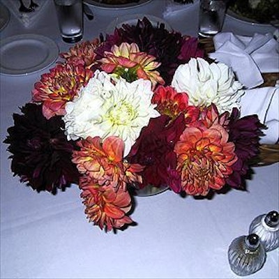 Floral centerpieces on the tables at the Jupiter Communications luncheon were by Accent on Flowers.