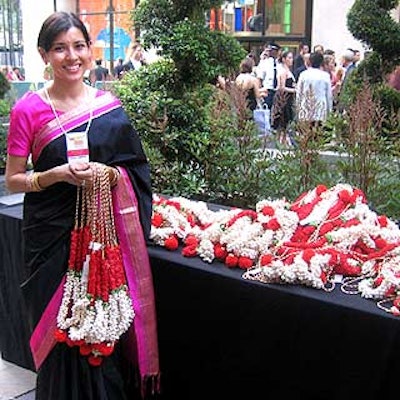 Citymeals-on-Wheels volunteer Veenu Narana handed out vibrant red, white and green necklaces for guests to wear.