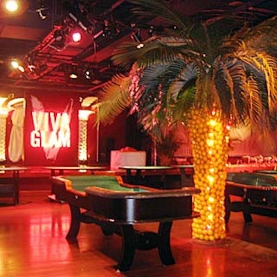 Casino tables from Minnesota Fats filled the Copacabana for the Design Industries Foundation Fighting AIDS' Viva Glam Casino benefit. David Beahm filled the center of the dance floor with a giant palm tree wrapped with oranges, and a Viva Glam sign in flashing lights stood onstage.