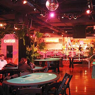Casino tables and cashier booths decorated with flashing lights filled the center of the room.