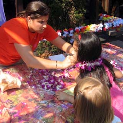 Three of the Hyatt Regency resorts in Hawaii were represented with a lei-making table at Hyatt Resorts' Camp Hyatt promotion. Kids could request colorful flower necklaces and bracelets.