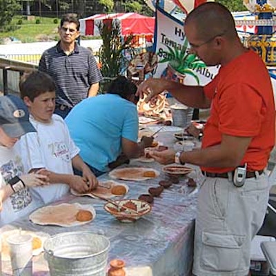 Showing off the cultural heritage of its surroundings, the Hyatt's New Mexico resort hosted a pottery-making booth.