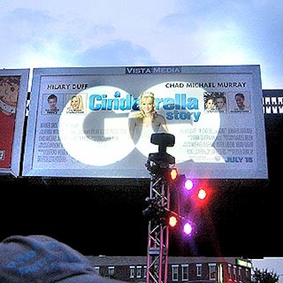 The party appropriated the billboards on the High Line overpass, projecting gobos of sponsors' logos on top of the existing advertisements.