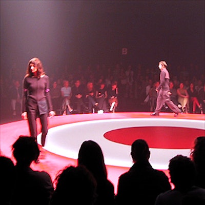 Target's fashion show was staged in the black box studio at Pier 59 Studio at Chelsea Piers, with a stage built by KadaN Productions Inc. and lights by Bernhard-Link Theatrical Productions.