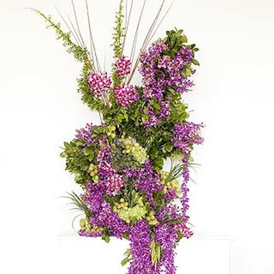 Orchid arrangements peppered the event for a Far East look.