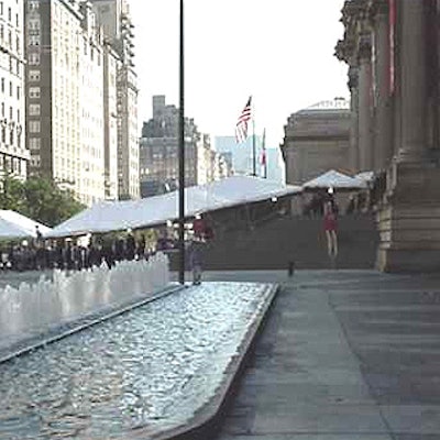 Diplomats arriving at the Metropolitan Museum of Art for President Clinton's event entered under a canopy from Starr Tents.