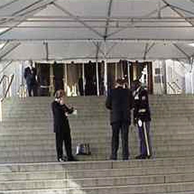 Diplomats arriving at the Metropolitan Museum of Art for President Clinton's event entered under a canopy from Starr Tents .