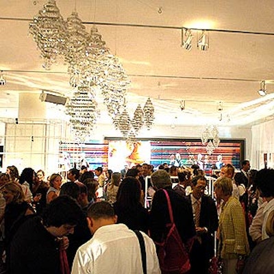 Guests mingled among the department-store-like displays inside Milk Studios. (Photo by Rohanna Martins)