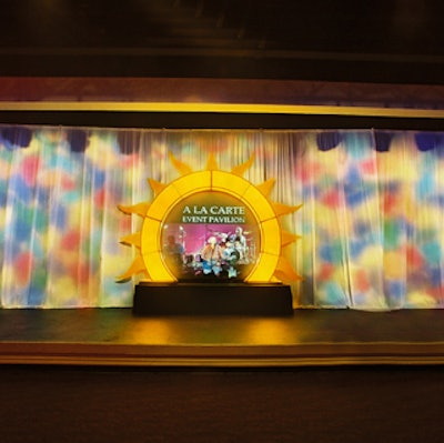 The stage was decorated with a large internally lit sun—the theme of the event produced by SHOWORKS.