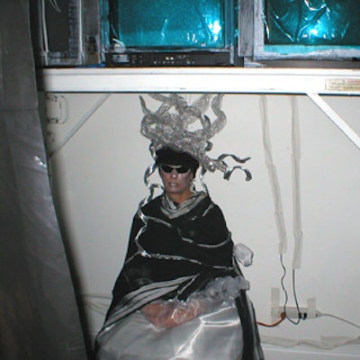 The Secret Artists' Society display focused on living art: a person hooked up to the walls became the exhibit.