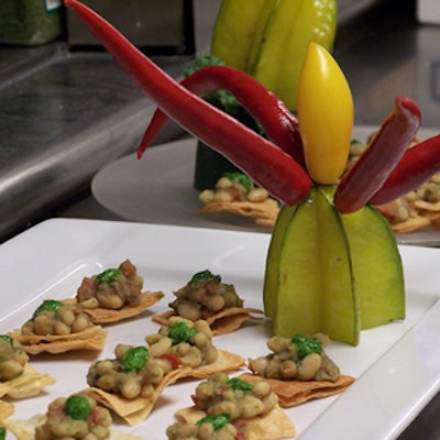 Tone catering created colourful jester-inspired serving tray accents.