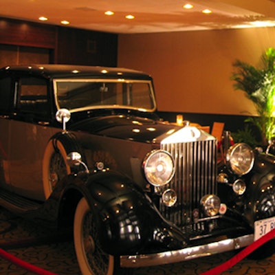 A vintage Rolls-Royce set the tone of the event with classic elegance.